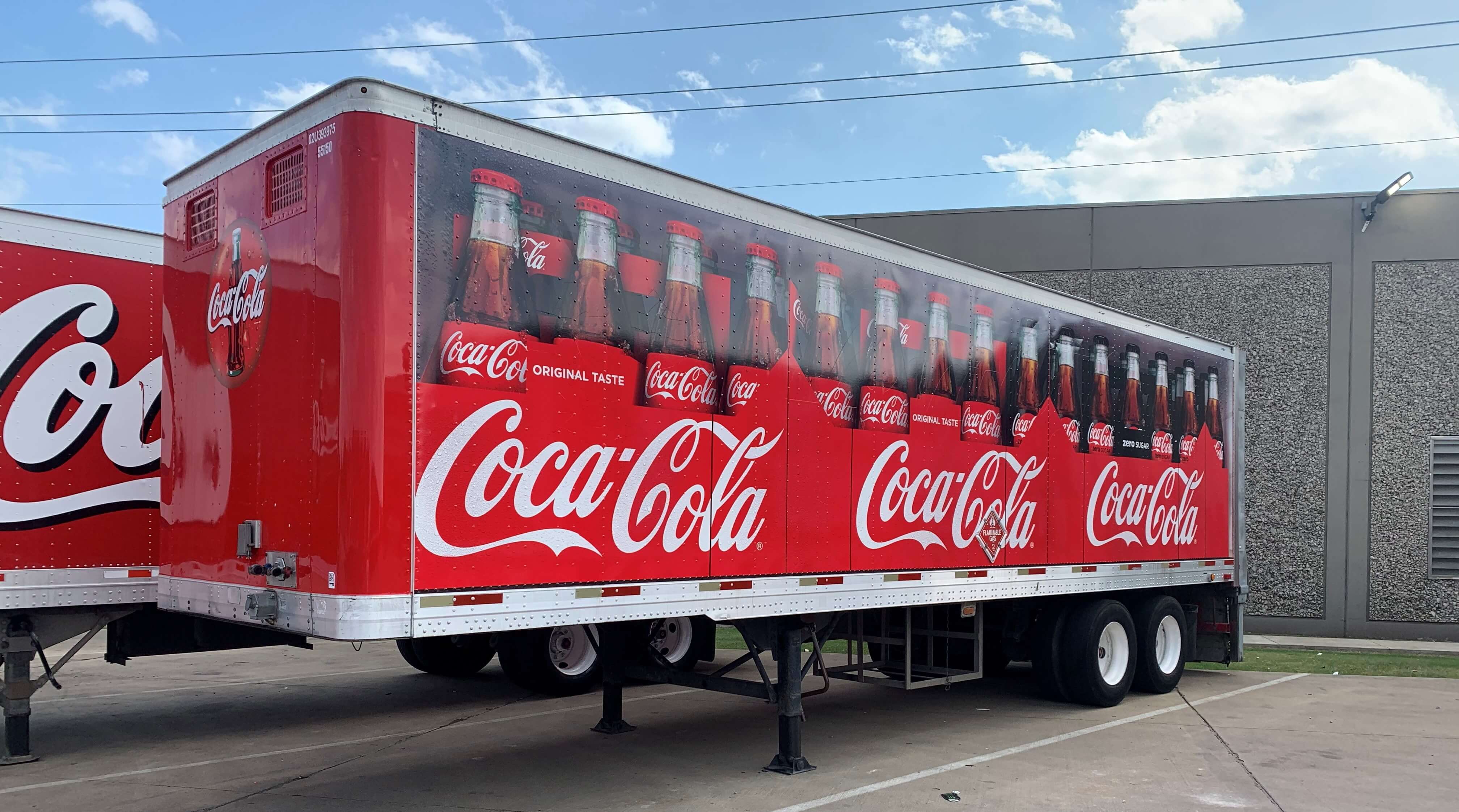 Coca-cola vehicle and trailer wrapping project by Turbo Images the leadet in trailer wrap so that your trailers adn their wraps will be mobile marketing assets. For nice graphics on your trucks and trailers, contact Turbo Images